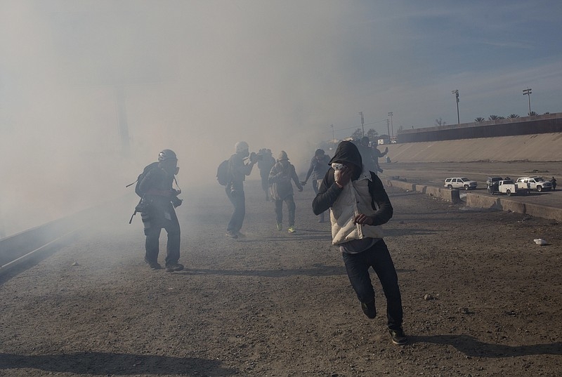 Trump strongly defends use of tear gas on caravan migrants