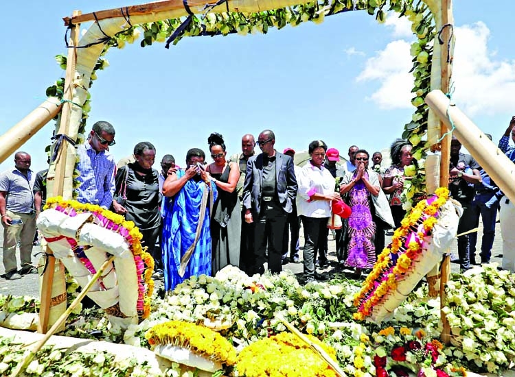 At Ethiopia flight memorial, white roses mark passing of lives