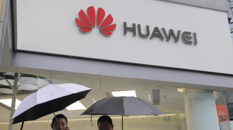 Huawei urges US to drop 'loser's attitude'