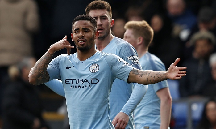 Sterling double takes Man City top once more