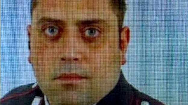 Huge manhunt for killers of Italian policeman