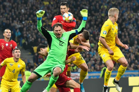Ukraine reach Euro 2020 despite Ronaldo's 700th goal