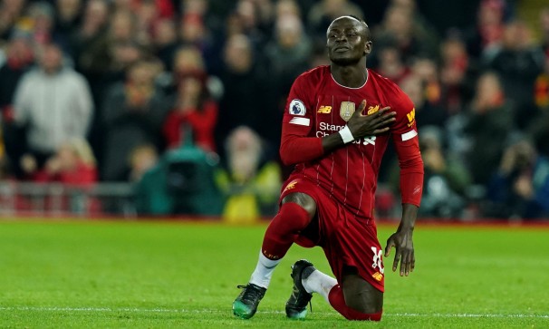Controversial Mane goal gets Liverpool past battling Wolves