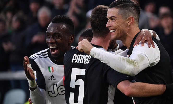 Ronaldo hat-trick puts Juventus top of Serie A
