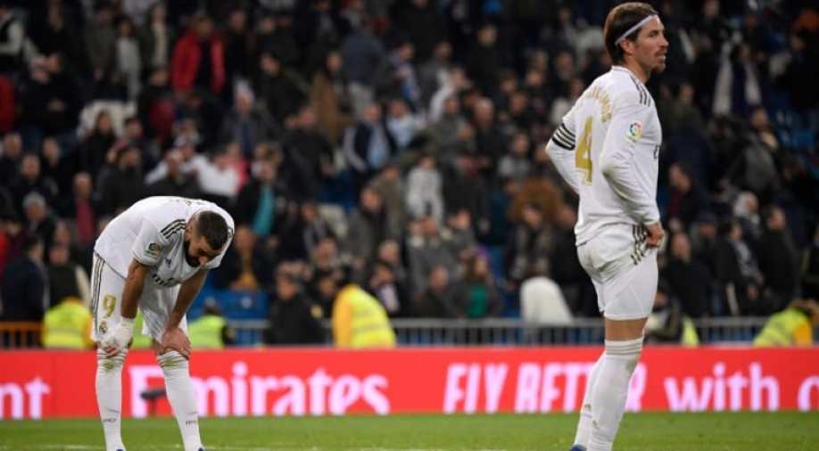 Celta strike late to put brakes on Real Madrid