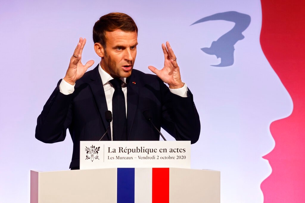 Macron stirs controversy with defence of French secularism