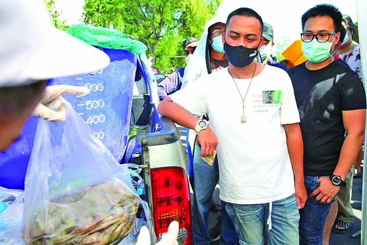 Thai protest demands help for shrimp sellers following virus outbreak