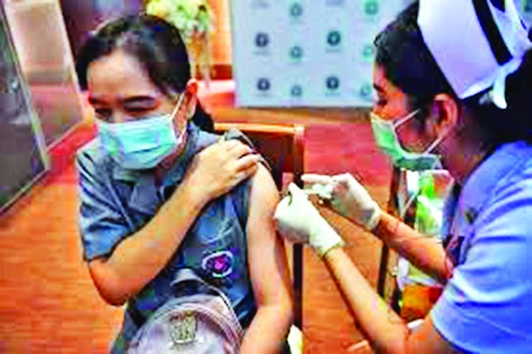 Thailand suspends vaccine rollout as Biden eyes