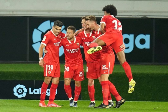 Sevilla win thriller to stay in title hun