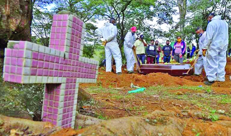 Brazil Graveyard personnel say 600 graves dug each day