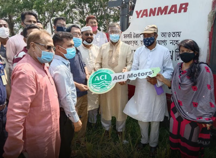 Hasan hands over combined harvester machines to Rangunia farmers