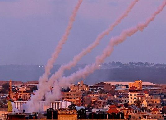 Gaza reels under Israeli strikes as violence enters second week