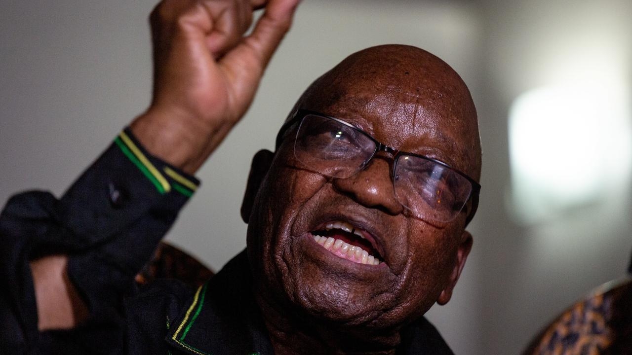 Zuma hands himself in to South African police