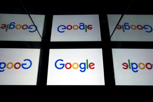 Google parent Alphabet profit soars as ads surge
