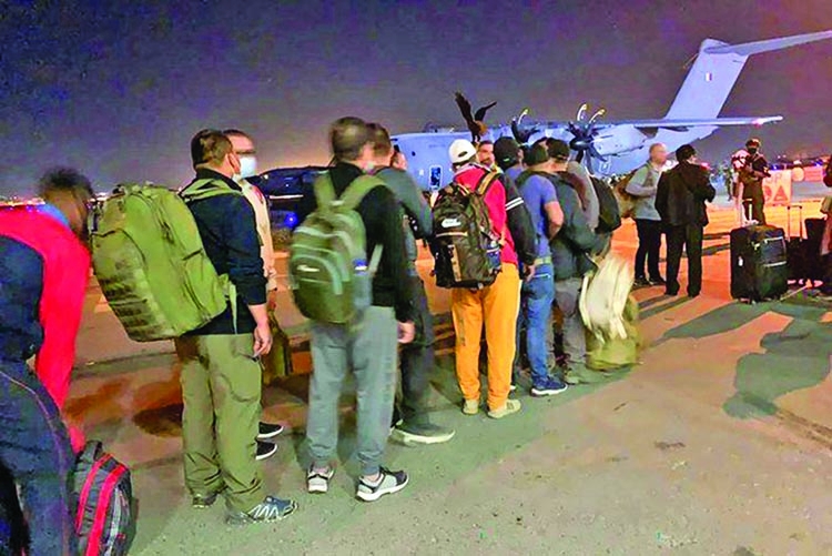 Evacuation flights resume  at Kabul airport as Biden defends US withdrawal