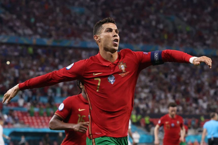 Record-breaking Ronaldo rescues Portugal with late double