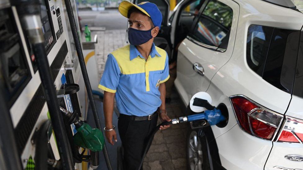 India cuts fuel taxes as prices hit record highs
