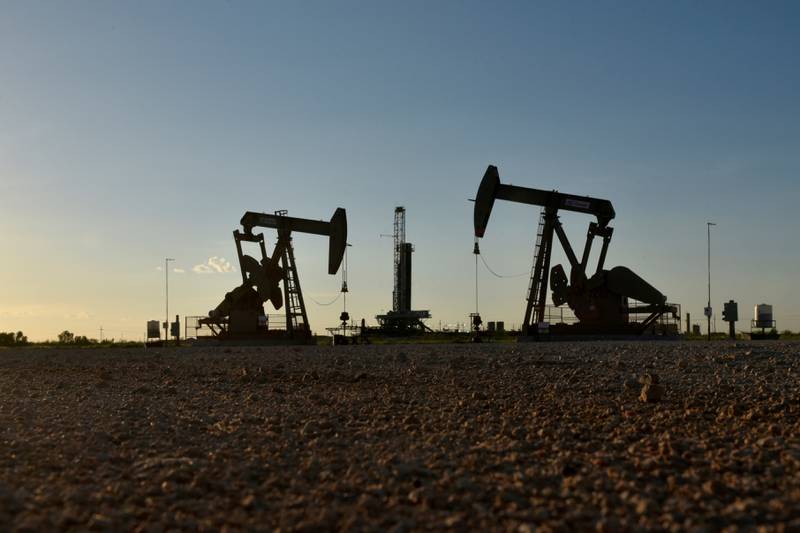 Oil gains as improving market outlook outweighs Omicron surge
