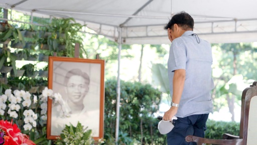 Philippine election winner Marcos visits dictator father's grave