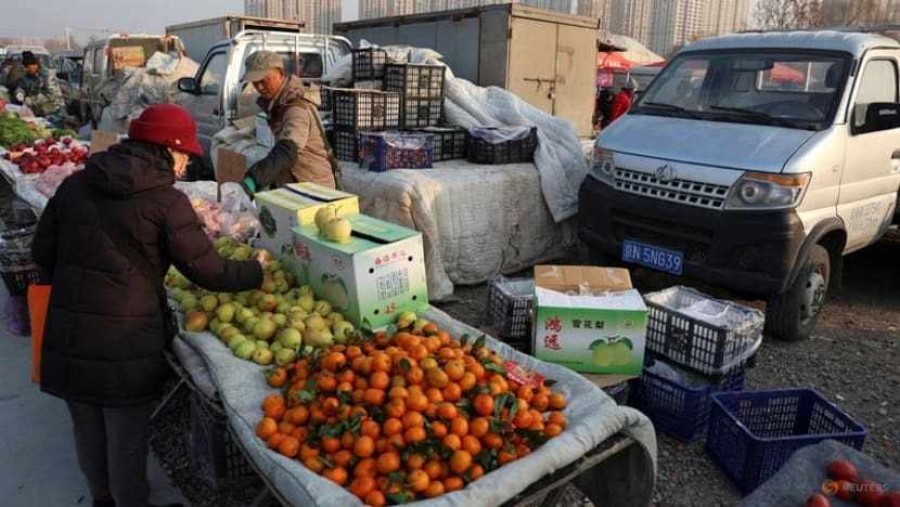 China's consumer prices rise for third month, factory deflation persists