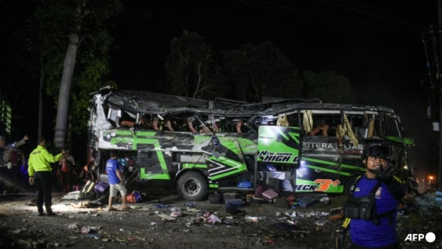 Indonesia school bus crash kills 11, dozens injured