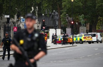 Pedestrians injured after car hits barriers at UK parliament
