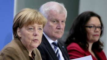German govt seeks to end standoff over spy chief