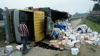 3 of a family killed as truck overturns in Tangail