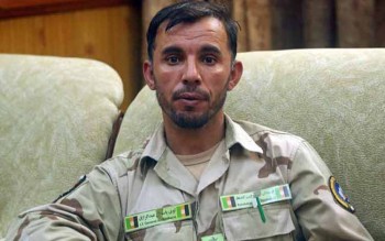 Top Afghan official killed in shooting, US general unhurt