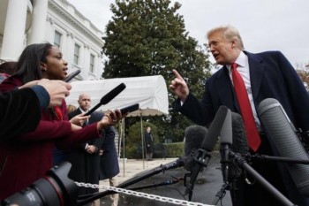 Trump insults reporters, claims Acosta video wasn't altered