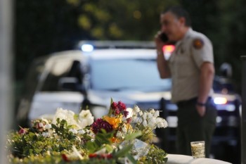 Gunman who killed 12 died from self-inflicted gunshot
