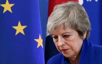 May under assault over EU exit deal