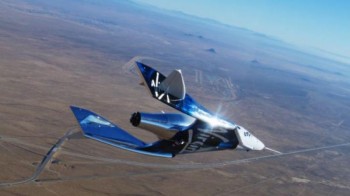 Virgin Galactic's first test passenger gets commercial astronaut wings