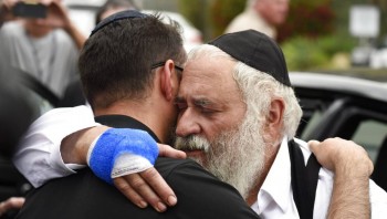 Rabbi says gun 'miraculously jammed' in California attack