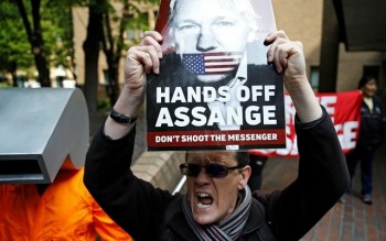 Assange sentenced to 50 weeks in British jail