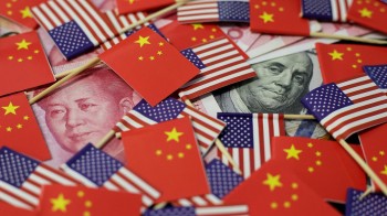 China says US can't use pressure to force trade deal