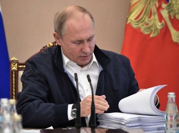 Putin promises social spending boost in annual call-in show