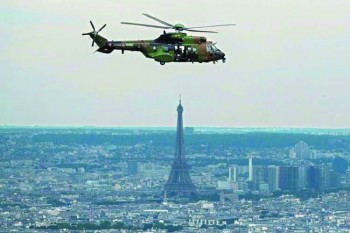 Macron to show off Euro defense cooperation  at Paris parade