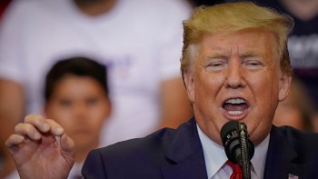 Trump hits China with more tariffs, sharply escalating trade dispute