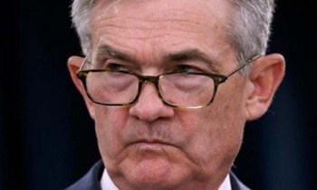 Asian markets drop as traders await Powell speech