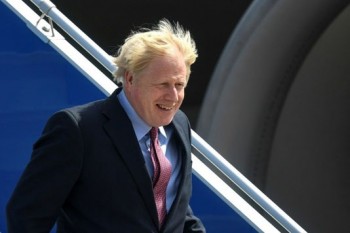 Johnson seeks to push Trump at fractious G7