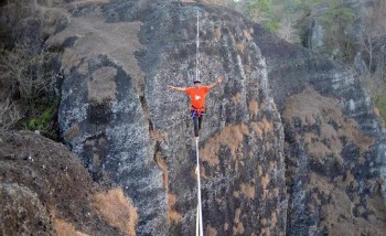 In pics: rope walk at height of 740 meters on Mount Nglanggeran in Indonesia