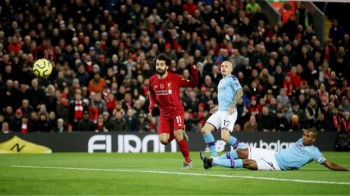 Liverpool beat Man City to boost title hopes