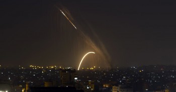 As rockets rain down, Israel intensifies its strikes in Gaza