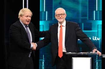 British PM and Labour leader spar over Brexit in first election debate