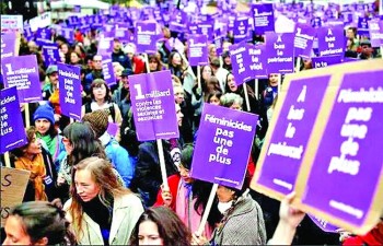 Thousands march in France to condemn domestic violence