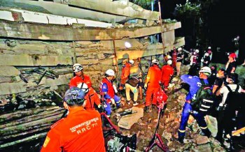 Ten dead in Cambodia building collapse, more trapped