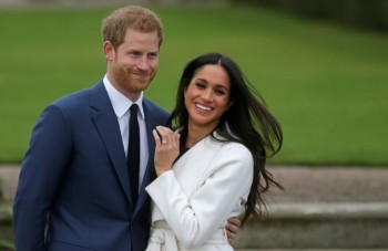 Harry and Meghan start new life in Canada with media spat