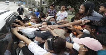 Philippine volcano alert lowered, thousands can return home