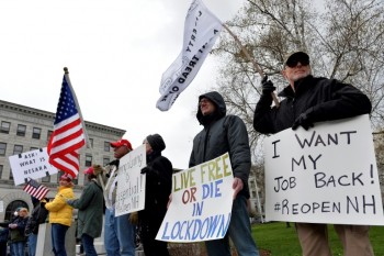 Hundreds protest against US virus rules